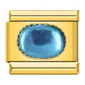 Charm con piedra azul y detalles dorados