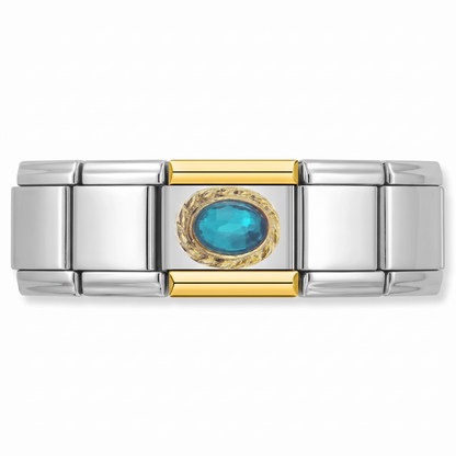 Charm piedra azul engarzada en un diseño dorado en pulsera italiana de eslabones