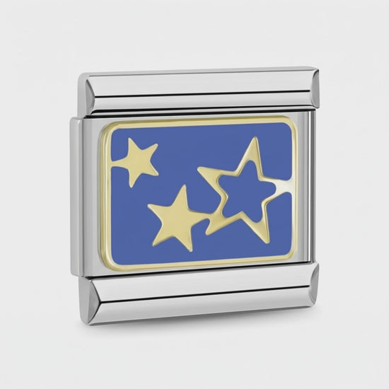 Video del Charm Estrellas (Fondo Azul, Plateado)