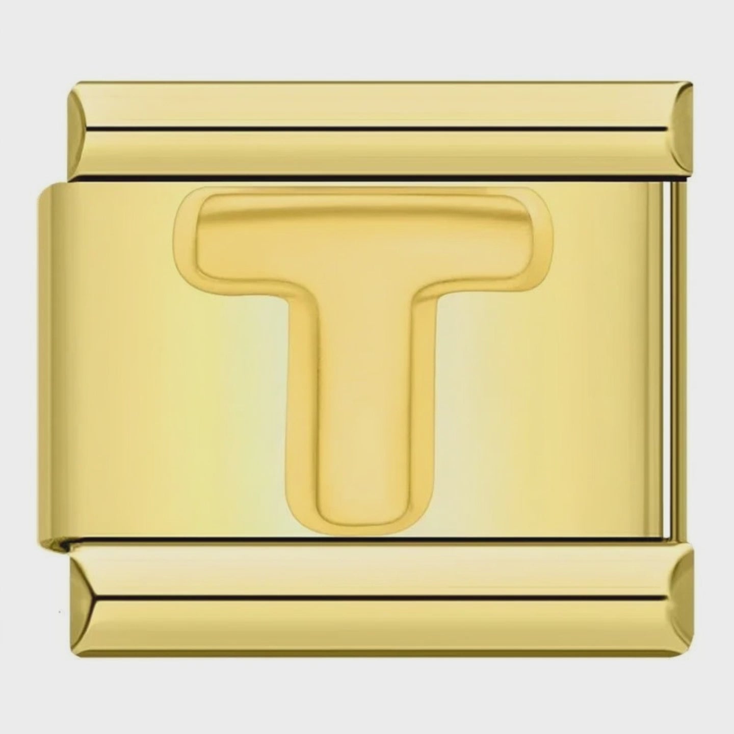 Video del Charm Letra T (Dorado)