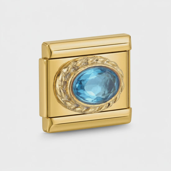 Video del Charm con una piedra azul engarzada
