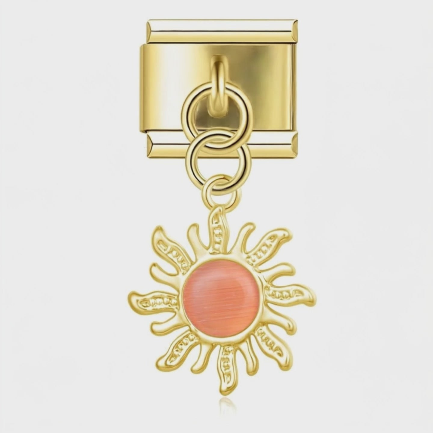 Charm Colgante sol naranja (Dorado) – video