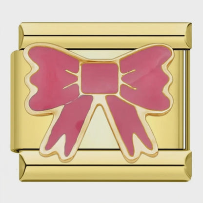 Video del Charm Moño (Dorado)