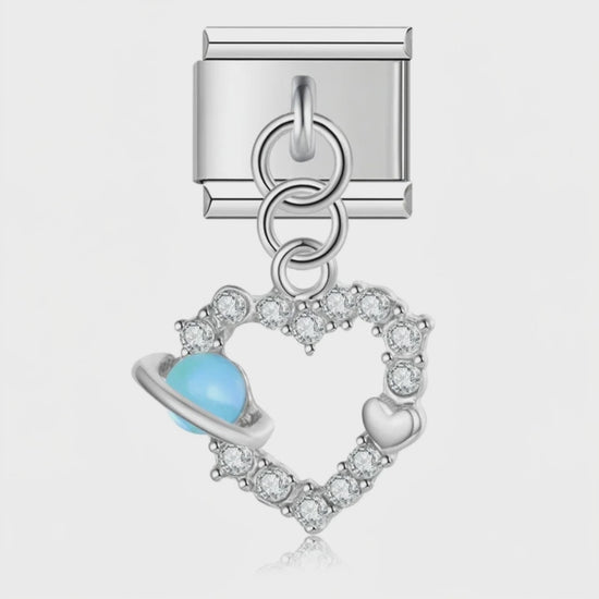 Video del Charm Corazon Planeta