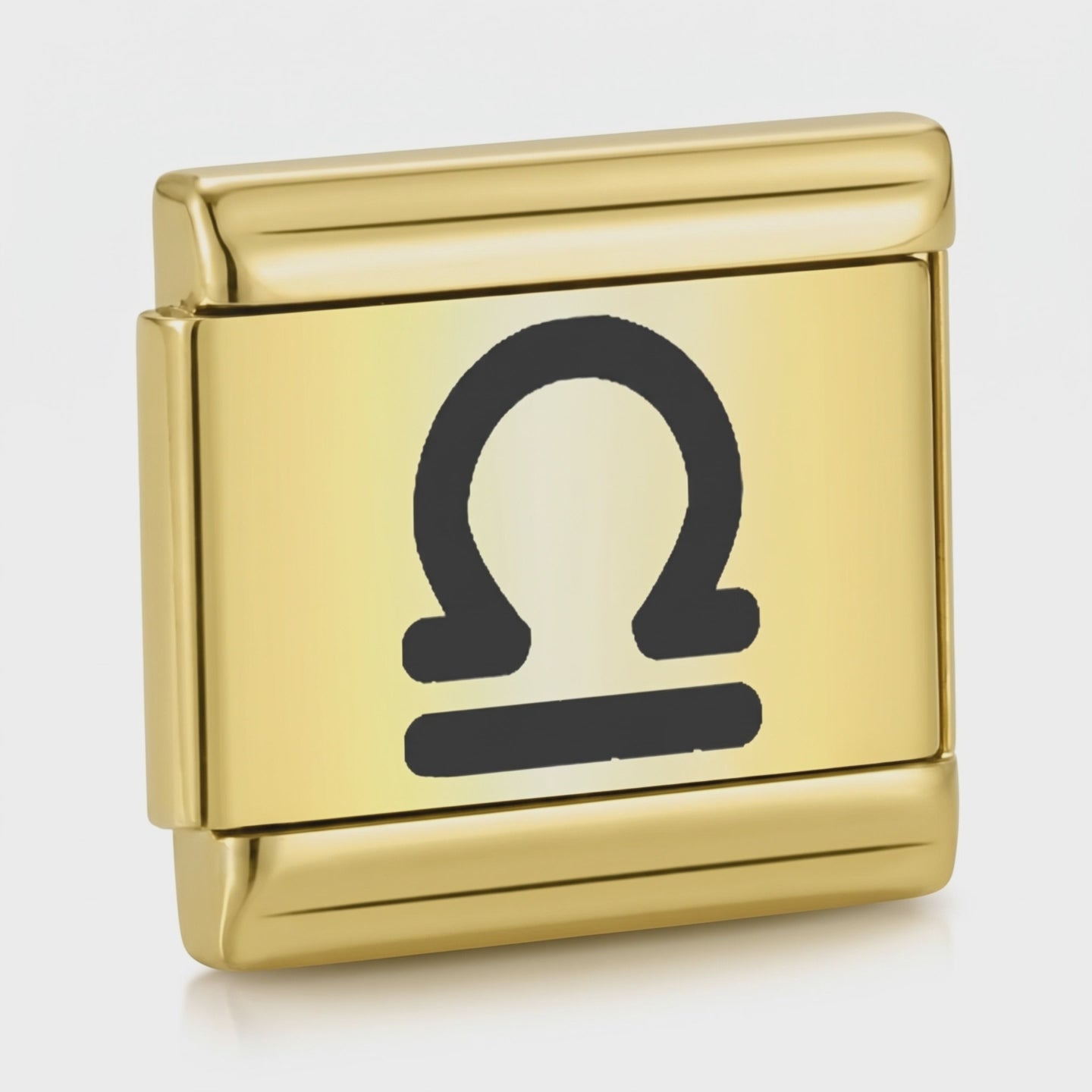 Video del Charm Libra (Dorado)